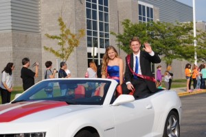 Michael riding in homecoming parade